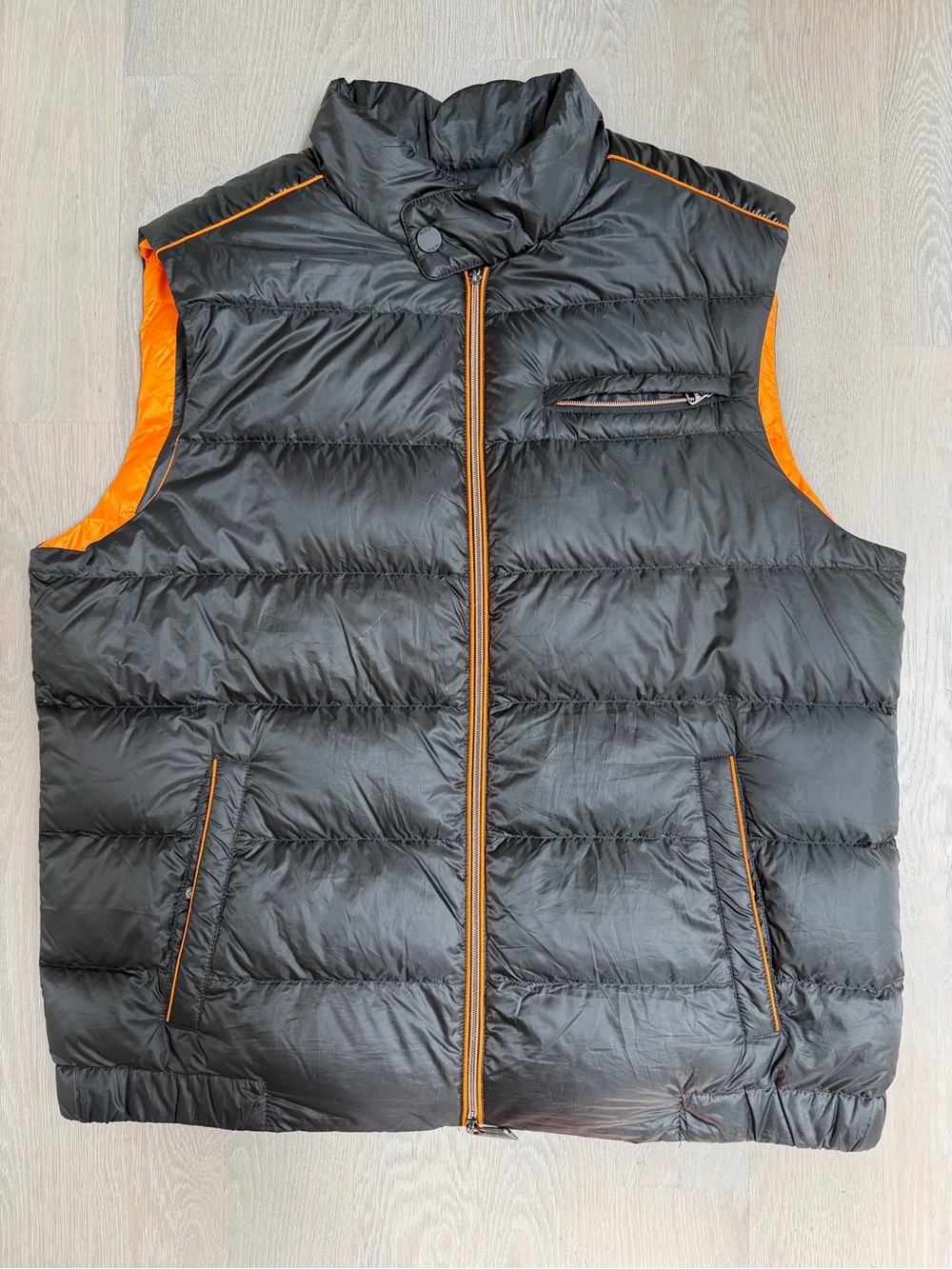 TumiPAX McLaren Packable Black Puffer Vest/Pillow with Orange Trim